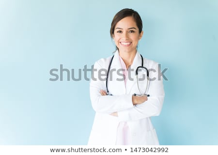 Stockfoto: Smiling Female Doctor With Arms Crossed