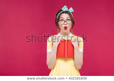 Stok fotoğraf: Funny Girl Student With Books In Glasses And A Vintage Dress