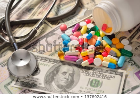 Foto stock: Close Up Of Addict Hands With Drugs And Money