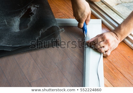 Foto stock: Ripped Old Patio Door Screen Replaced With New One