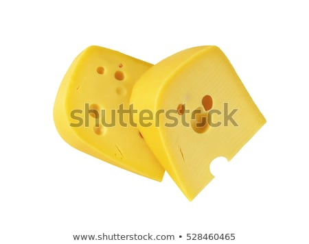 Foto stock: Wedge Of Yellow Cheese With Eyes
