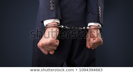 Foto stock: Arrested Man With Balance On The Background