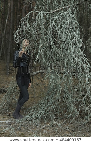 Stock photo: Woman Walking In Savage Garden