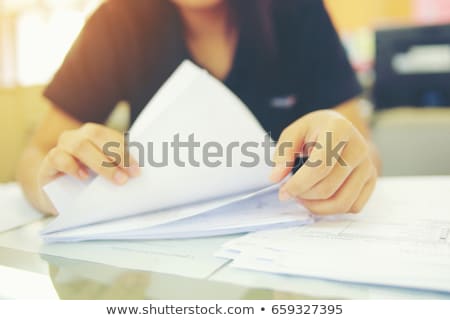 Foto d'archivio: Office Worker Holding Folders