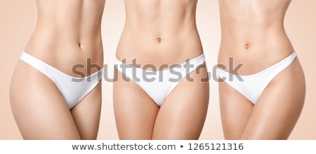Foto stock: Slender Woman Wearing White Underwear