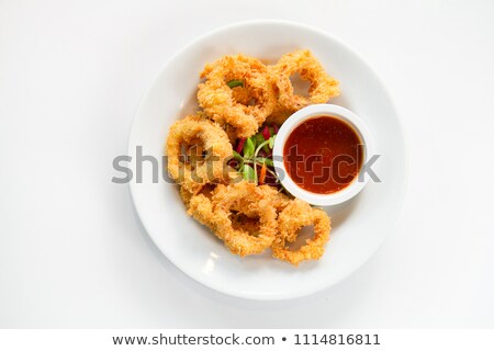 Foto stock: Fried Calamari Breaded Served With Sauce