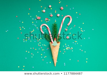 Stock photo: Christmas Candies On Green Background