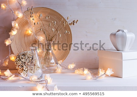 ストックフォト: Soft Home Decor Of Glass Vase With Spikelets And Wooden Plate On White Wood Background