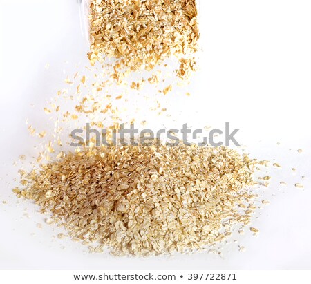 Stock foto: Bowl Of Oat Flakes With Raisins