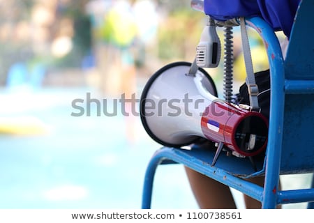 Stockfoto: A Fit Lifeguard With Megaphone