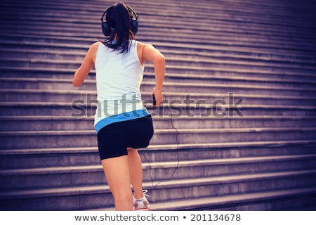 Foto stock: Successful Fitness Women With Smartphone