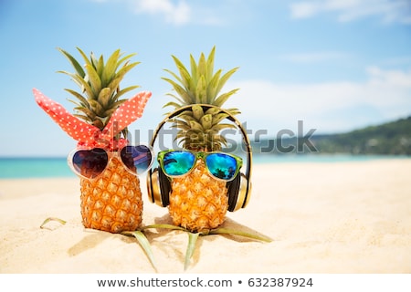 Foto stock: Earphones On Summer Beach Sand