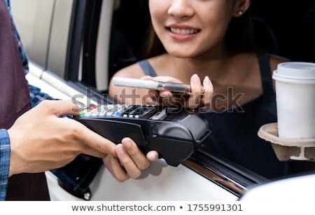 Stock photo: Asian Customer Make Contactless Mobile Payment Drive Thru