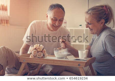 Stock fotó: Senior Couple Having Breakfast In Bed