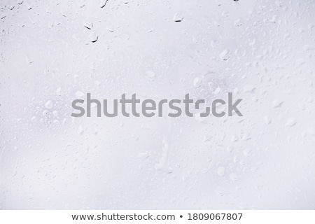 Stok fotoğraf: Drops On Glass After Rain