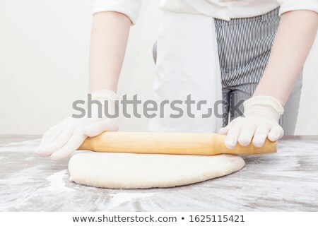 Stockfoto: Rolling Out Dough For Pizza