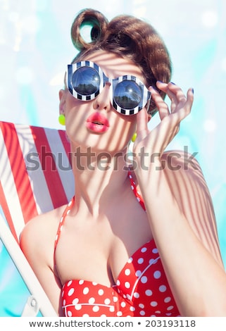 Stock photo: Pin Up Girl In The Swimming Pool