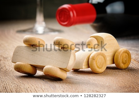 [[stock_photo]]: Alcoholic Drink And A Toy Car