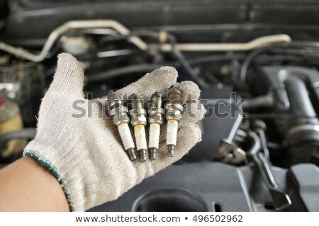 Stock photo: Auto Mechanic Checking Car Engine Spark Plug Wires