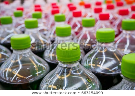 Foto stock: Carbonated Orange Soft Drink Plastic Bottle