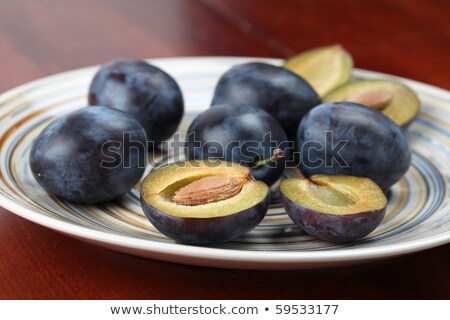 Stock photo: Close Up Of Plums On Plate