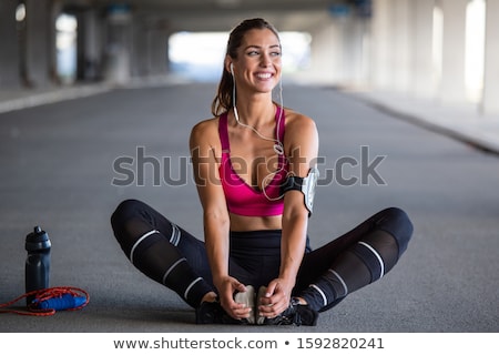 Foto stock: Woman Is Making Gymnastic Exercises