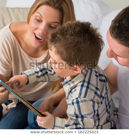 Stok fotoğraf: Family Picture - Parents With 2 Year Old Son  