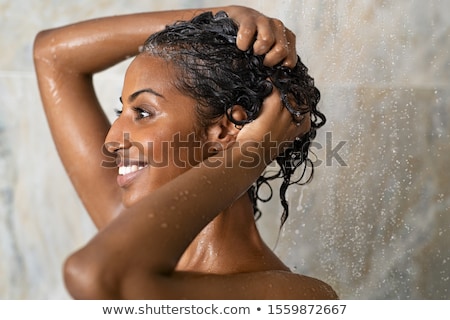 Stock photo: Woman Washing Hair