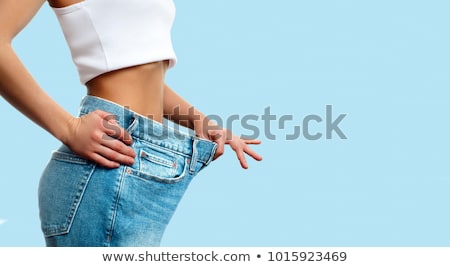 Stock fotó: Woman On Diet With Oversized Pants