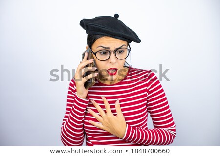 Stock photo: Worried Young Beauty Brunette Over White Wall