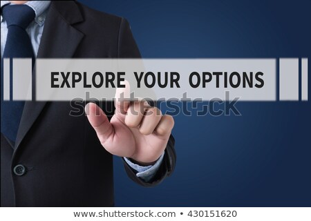 Foto stock: Explore Your Options On Laptop In Modern Workplace Background