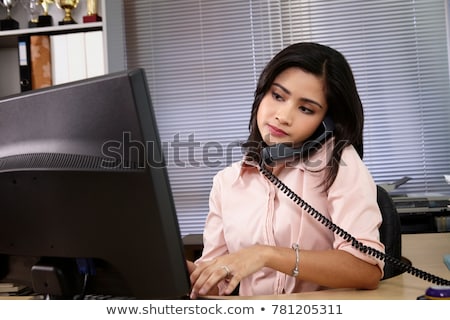 Stockfoto: Businesswoman Using Telephone