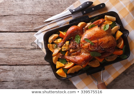 Stock photo: Baked Whole Chicken With Apples In Pan