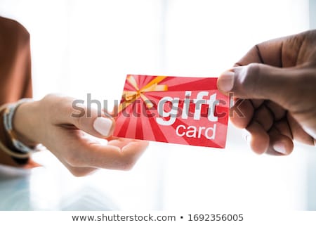 Zdjęcia stock: Man Holding Red Gift Card