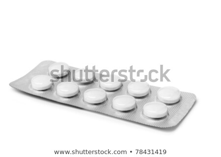 Foto stock: Grey Box With Orange Pills Blister Pack