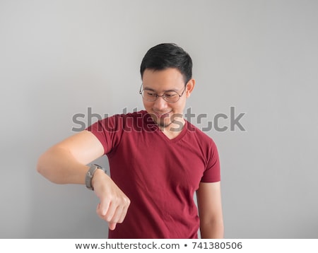 Foto stock: Countdown A Business Man Looks At His Watch