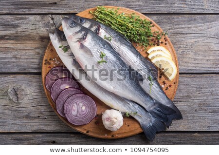 ストックフォト: Sea Bass Fish On Slate Black Board Top View