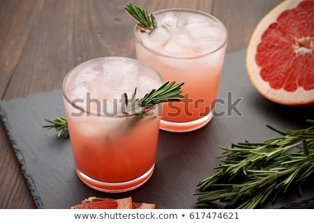 Foto stock: Refreshing Drink Grapefruit And Rosemary Cocktail