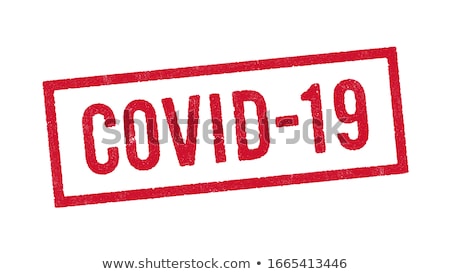 Foto stock: A Red Stamp On A White Background - Caution