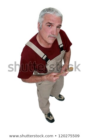 Stockfoto: Top View Of Middle Aged Painter Holding Brush