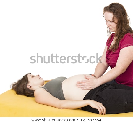 Stok fotoğraf: Midwife Sitting Behind Pregnant Woman