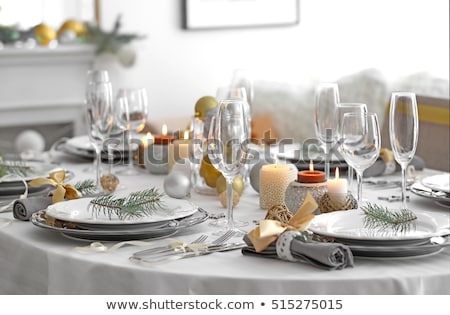 Stock fotó: Christmas Table Setting With Candles And Xmas Gift