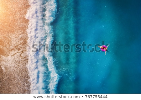 Stockfoto: Beautiful Girl Relaxing On A Tropical Beach