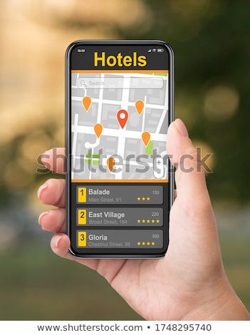 Stock fotó: Woman Tourist Using Navigation App On The Mobile Phone Navigation Map On A Smartphone In A Big City