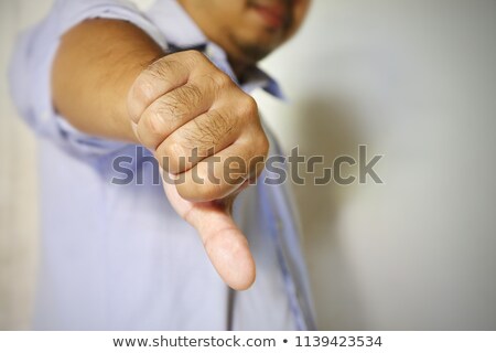 Stock fotó: Portrait Of A Businessman Giving A Helping Hand Against A White Background