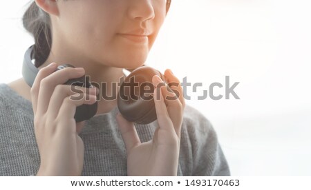 [[stock_photo]]: Teen Girl Holding Headphones