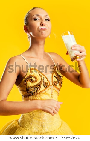 Stok fotoğraf: Ballerina With Glass Of Milk Or Yoghurt