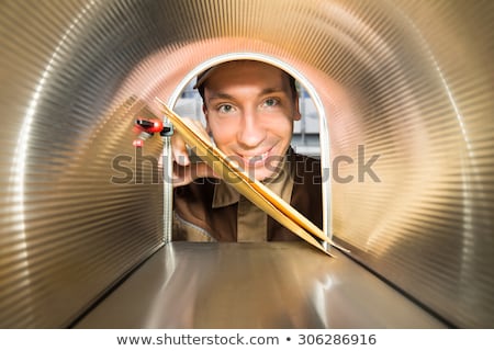 Stockfoto: Mailman Placing Envelopes View From Inside The Mailbox