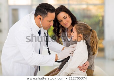 Stock photo: Doctor Checking Up Little Girl Health