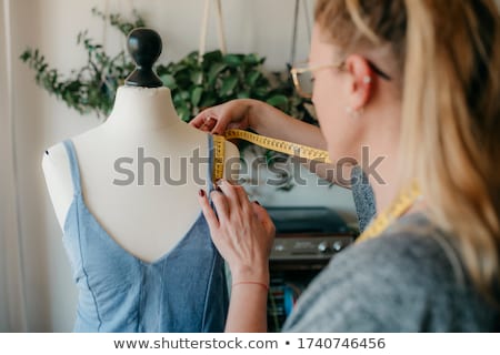[[stock_photo]]: Dressmaker Working With Mannequin